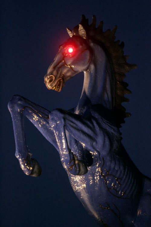 The horse of death has eyes that light up red at night